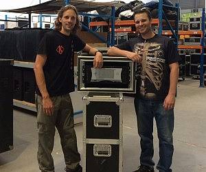 Michael Edwards (Kilowatt AV) takes ownership of the new AI Media Server. With him is Bradley Bruchhausen who represents DWR in Cape Town.