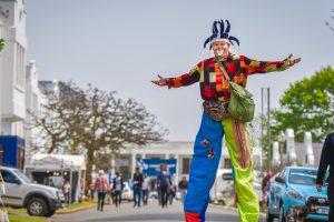 Jaco The Clown tries to keep balance in strong winds at the 2016 Hilton Arts Festival at Hilton College yesterday. photo. Jonathan Burton