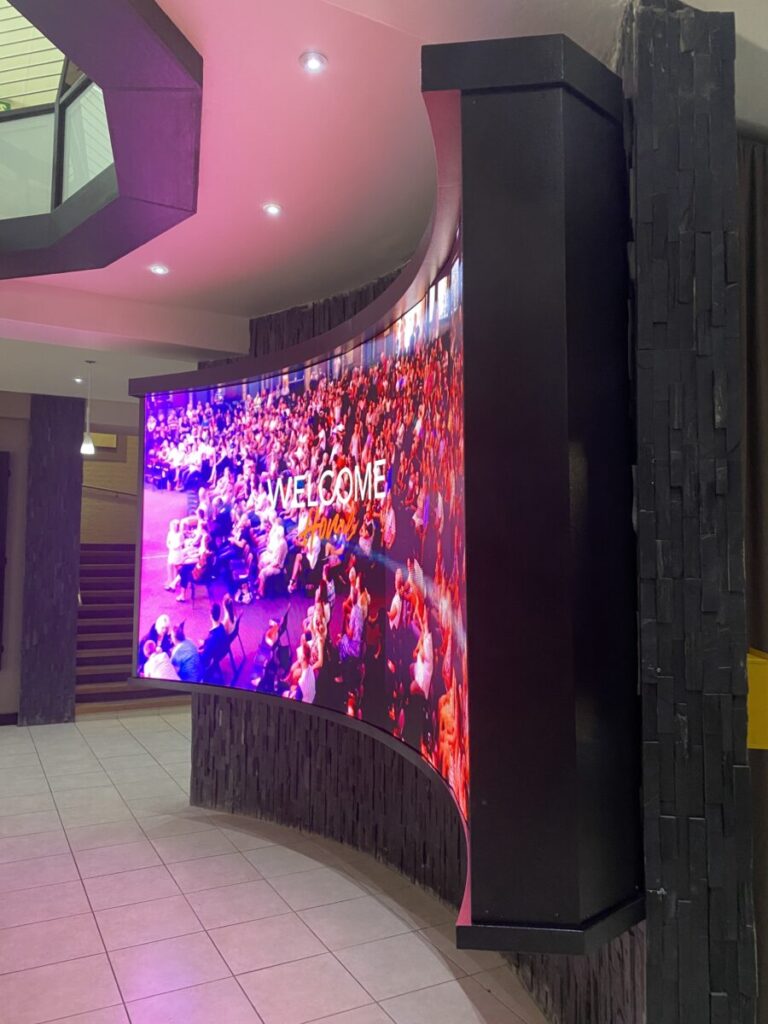 1 Maranatha recently acquired an Absen PL2.9 lite LED curved screen positioned in the churchs entrance foyer